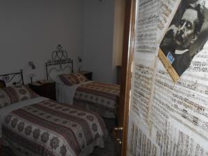 Postel nebo postele na pokoji v ubytování Jackie O' a la maison