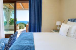 Postel nebo postele na pokoji v ubytování Le Capase Resort Salento