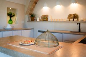 A kitchen or kitchenette at Dimora Sighé, exclusive rural villa with hydromassage pool