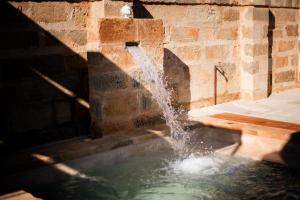 The swimming pool at or close to Dimora Sighé, exclusive rural villa with hydromassage pool