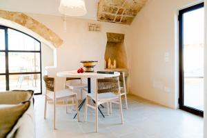 A seating area at Dimora Sighé, exclusive rural villa with hydromassage pool