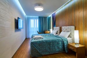 Postel nebo postele na pokoji v ubytování Light Hotel
