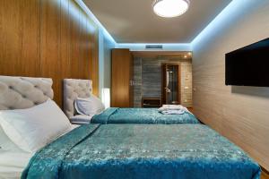 Postel nebo postele na pokoji v ubytování Light Hotel