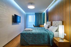 Postel nebo postele na pokoji v ubytování Light Hotel
