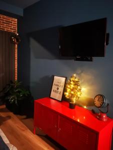 TV a/nebo společenská místnost v ubytování New Gudauri Loft 1 Apartment