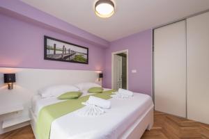 Cama ou camas em um quarto em Villa Zdenka