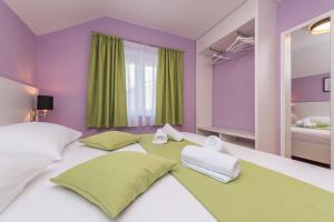 Cama ou camas em um quarto em Villa Zdenka