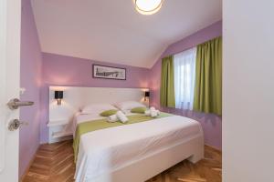 Cama ou camas em um quarto em Villa Zdenka