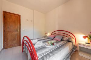 Letto o letti in una camera di AffittaSardegna-Trilo Grosseto