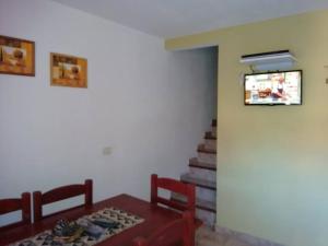 Et tv og/eller underholdning på Complejo Playa Grande