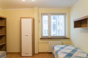 Postel nebo postele na pokoji v ubytování Apartament Na Urlop - Centrum - Przy Amfiteatrze - 500m do Basenów Wisła + 14 fotografií