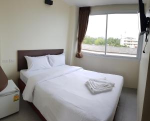 Ένα ή περισσότερα κρεβάτια σε δωμάτιο στο Top Hostel Samui