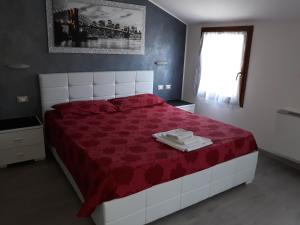 Postel nebo postele na pokoji v ubytování B&B Casa Taty