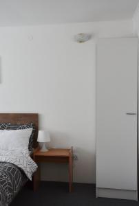 Postel nebo postele na pokoji v ubytování Enka apartmani