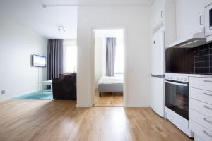 Cucina o angolo cottura di ApartDirect Linköping Arena