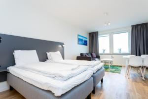 Letto o letti in una camera di ApartDirect Linköping Arena