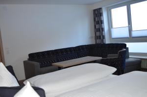 Postel nebo postele na pokoji v ubytování Haus Garni Luggi Leitner