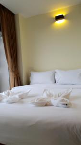 Ένα ή περισσότερα κρεβάτια σε δωμάτιο στο Top Hostel Samui