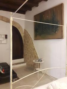 Postel nebo postele na pokoji v ubytování Abbazia Degli Svevi