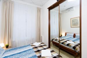Кровать или кровати в номере Centeral Hostel Moscow
