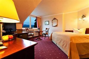 Postel nebo postele na pokoji v ubytování Hotel Am Rehberg + 37 fotografií