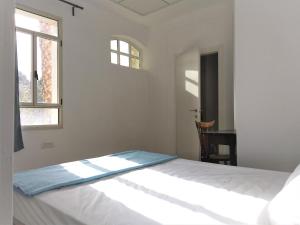 Postel nebo postele na pokoji v ubytování Haifa Hostel