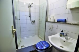Et badeværelse på Apartment Köln-Mülheim