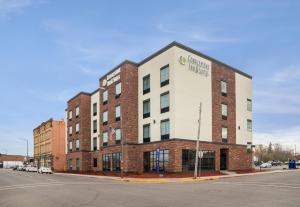 a rendering of a building on the corner of a street at Cobblestone Inn and Suites - Ashland in Ashland