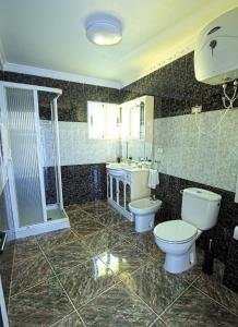 Kylpyhuone majoituspaikassa Villa Los Llanos