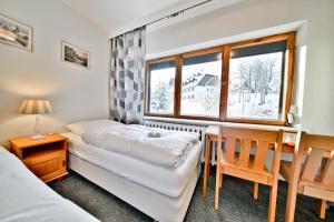 Postel nebo postele na pokoji v ubytování Panorama Gór w Karpaczu