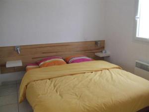Säng eller sängar i ett rum på Maison La Tranche-sur-Mer, 3 pièces, 4 personnes - FR-1-194-78