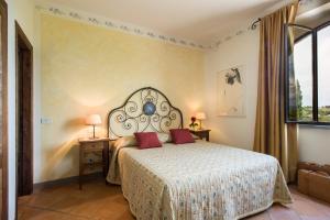 Postel nebo postele na pokoji v ubytování B&B Ponte a Nappo San Gimignano