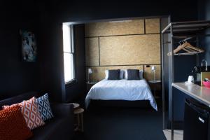 Postel nebo postele na pokoji v ubytování The Franklin Boutique Hotel