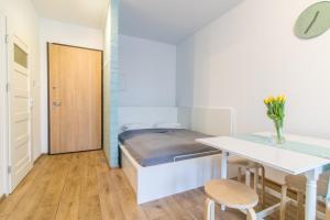 Posteľ alebo postele v izbe v ubytovaní Apartament Master