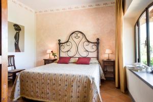 Postel nebo postele na pokoji v ubytování B&B Ponte a Nappo San Gimignano