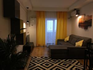 O zonă de relaxare la Luxury apartment with pool in North Bucharest