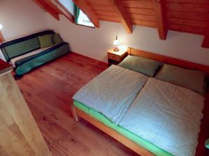 Кровать или кровати в номере Kajzrovka