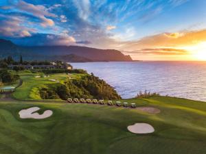 a golf course with a view of the ocean at 1 Hotel Hanalei Bay in Princeville
