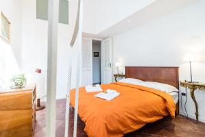Кровать или кровати в номере Nice Apartment Navona Square