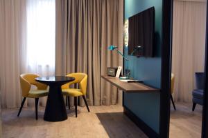 TV a/nebo společenská místnost v ubytování Best Western Hotel Cristallo