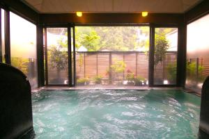 a large indoor swimming pool in a house at New Ogiya in Fukushima