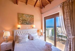 Postel nebo postele na pokoji v ubytování Casa Leone Suites