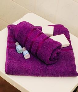 a purple towel sitting on top of a table at Cecilka in Náchod