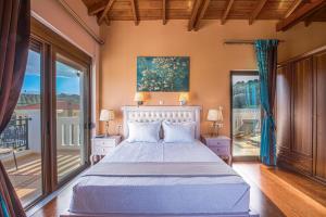 Postel nebo postele na pokoji v ubytování Casa Leone Suites