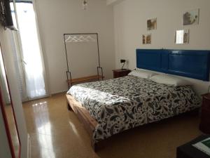 A bed or beds in a room at I Cavalieri di Malta