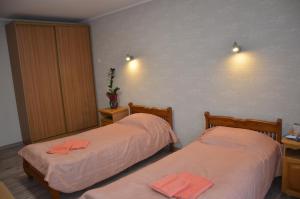 Postel nebo postele na pokoji v ubytování Hotel Trias