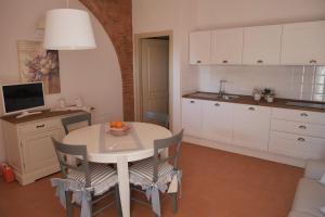 Kuchyň nebo kuchyňský kout v ubytování Agriturismo Due Comuni