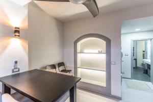 a dining room with a table and chairs at Futura, Bologna by Short Holidays in Bologna +33 photos