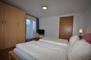 Cama o camas de una habitación en Haus Fritz