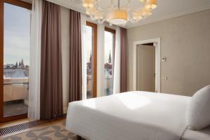 
Кровать или кровати в номере Резиденции Москва - Сервисные Апартаменты

